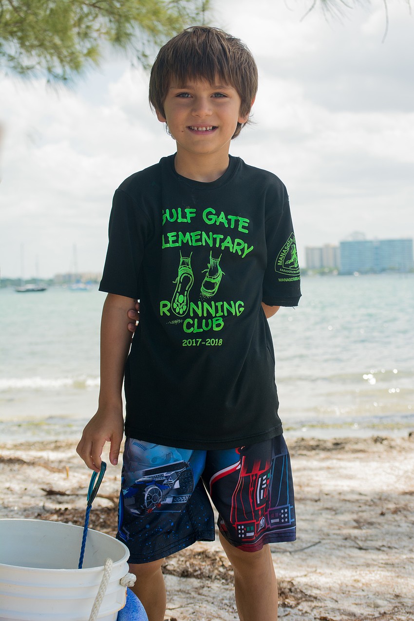 Sam Vaughan  learns about the bay's sea life.