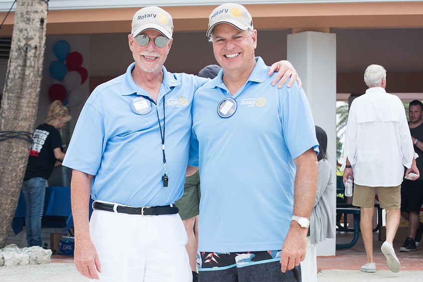 Rotary Club president Jay Sparr and Brian Maddox