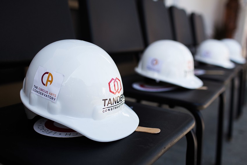 Hardhats from construction partner Tandem Construction were given to guests.