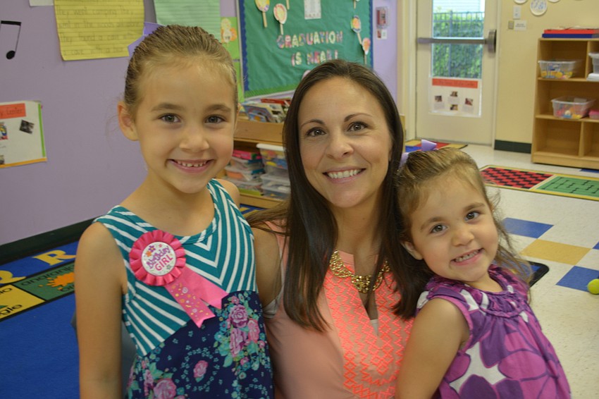 Parrish's Kendall Sharp, 6, and Kelsey Sharp, 3, with mom Jenna Sharp. 
