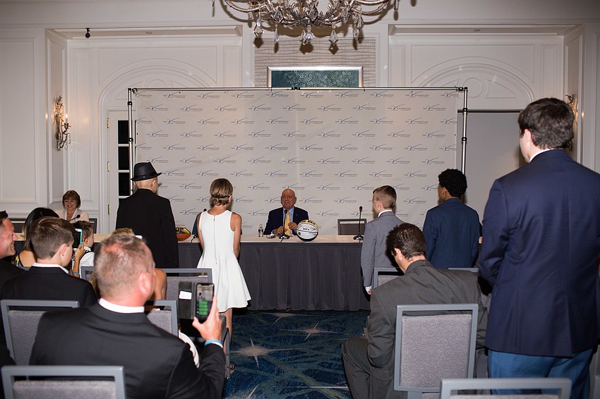 Dick Vitale asks all the children at the press conference to stand.
