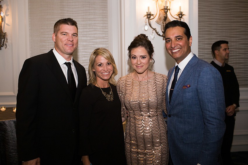 Todd and Shannon Johnson with Monica and Kevin Negandhi
