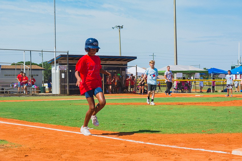 Laila Chance tries to make it to first base.