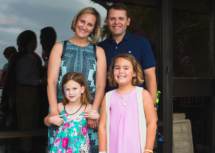 Heather and Jeff Weisenborn with their daughters, Hadley Grace and Charlotte.