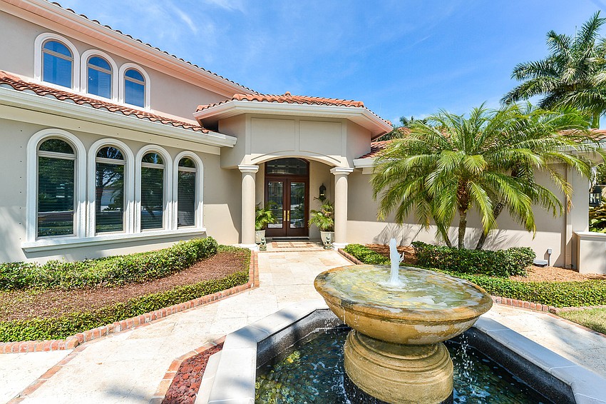 A fountain greets visitors at the entrance.