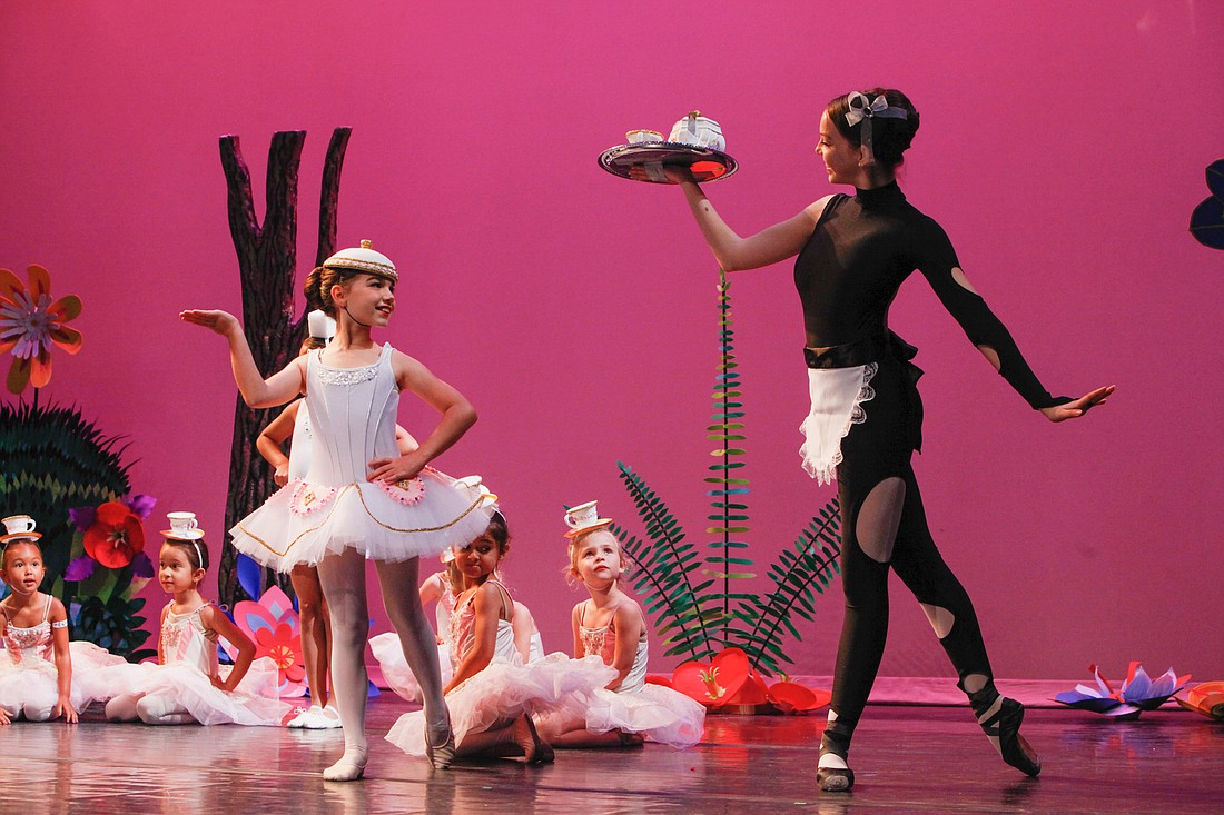 Nine-year-old Brooke Schaal, left, performs with Ashlyn Rutherford, 17.
