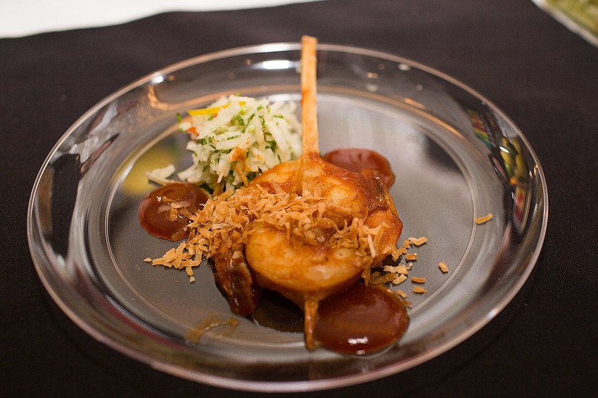 Michael's On East served sugar cane-skewered citrus BBQ shrimp.