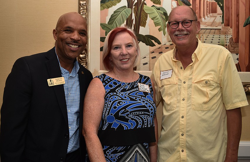 City of Sarasota Deputy City Manager Marlon Brown, Julie Bales and St. Armands Resident Association President Kevin Bales