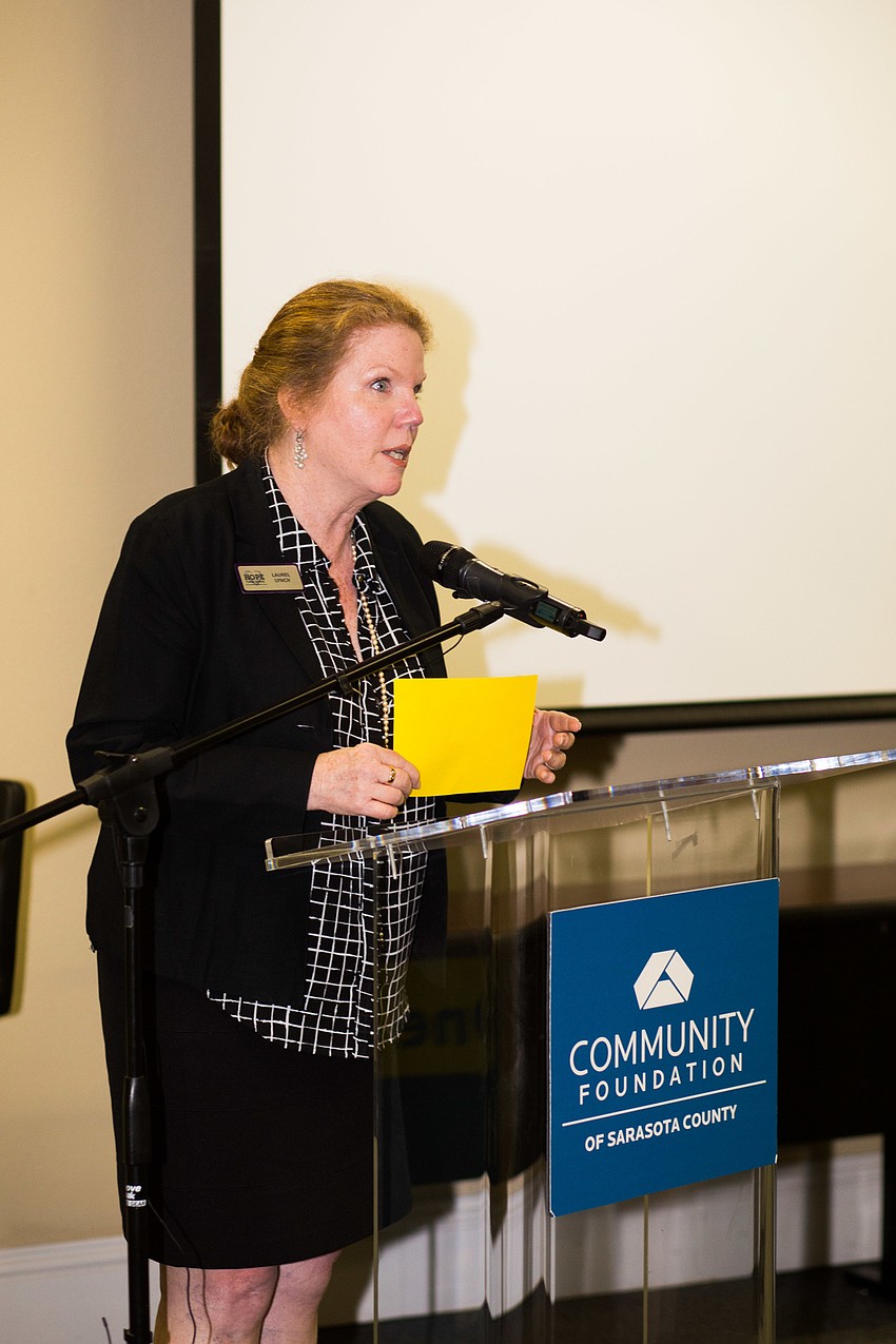 Hope Family Services Executive Director Laurel Lynch addresses the audience.