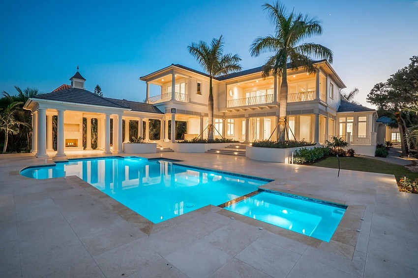 A pool and spa are the focal points of the outdoor entertainment area.