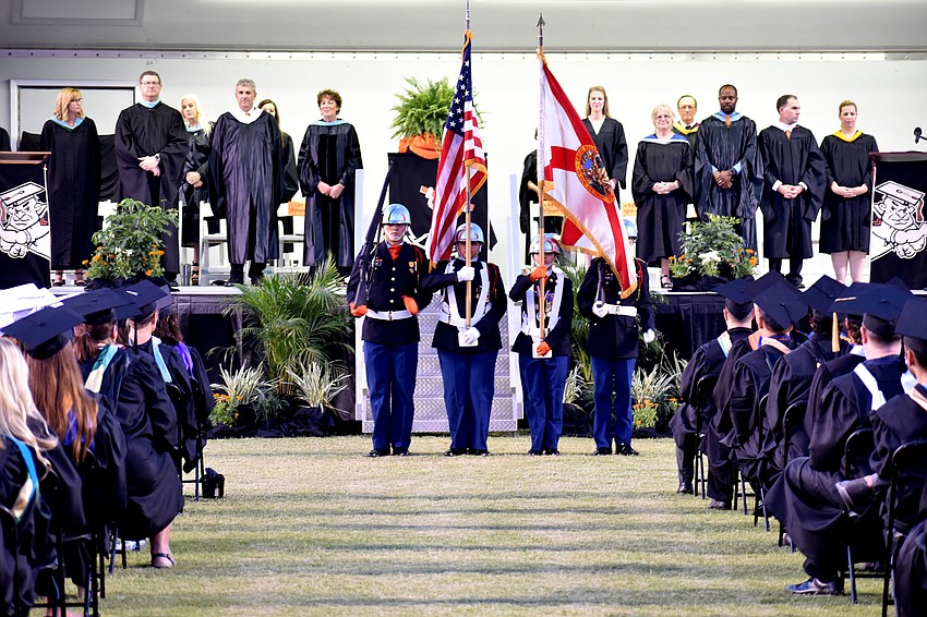 The color guard presents the American flag in the beginning of the ceremony.