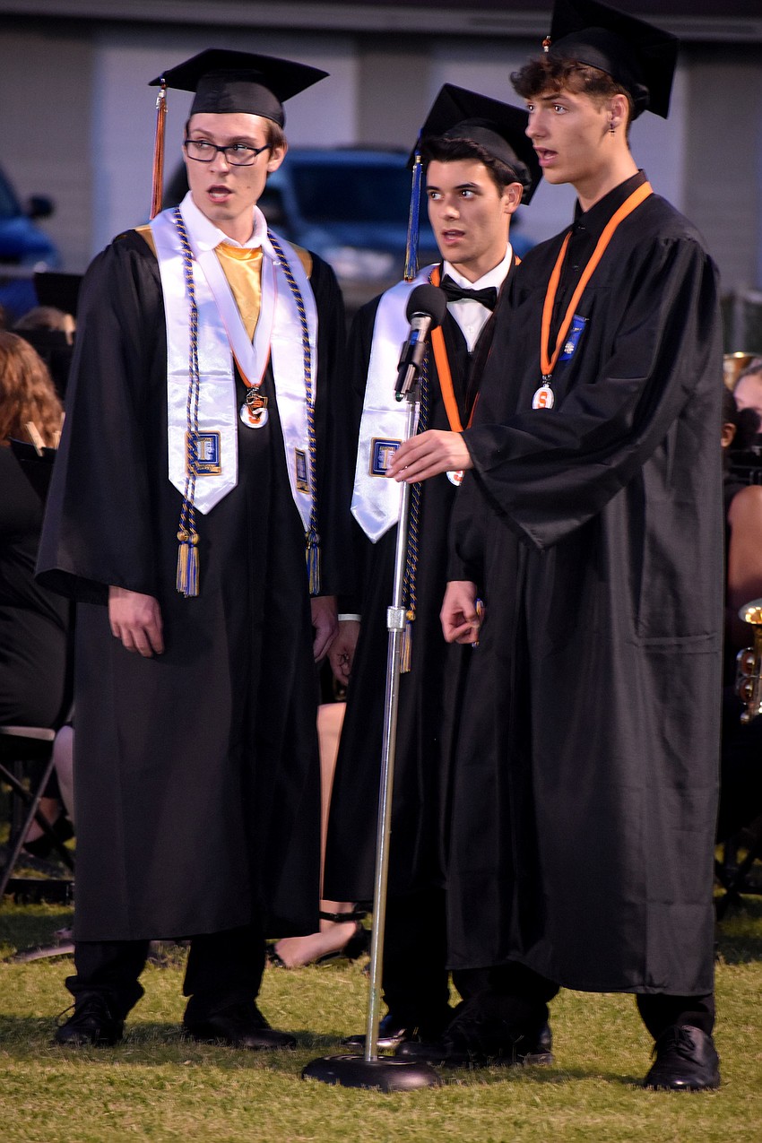 Seniors sing the alma mater to kick off the ceremony.