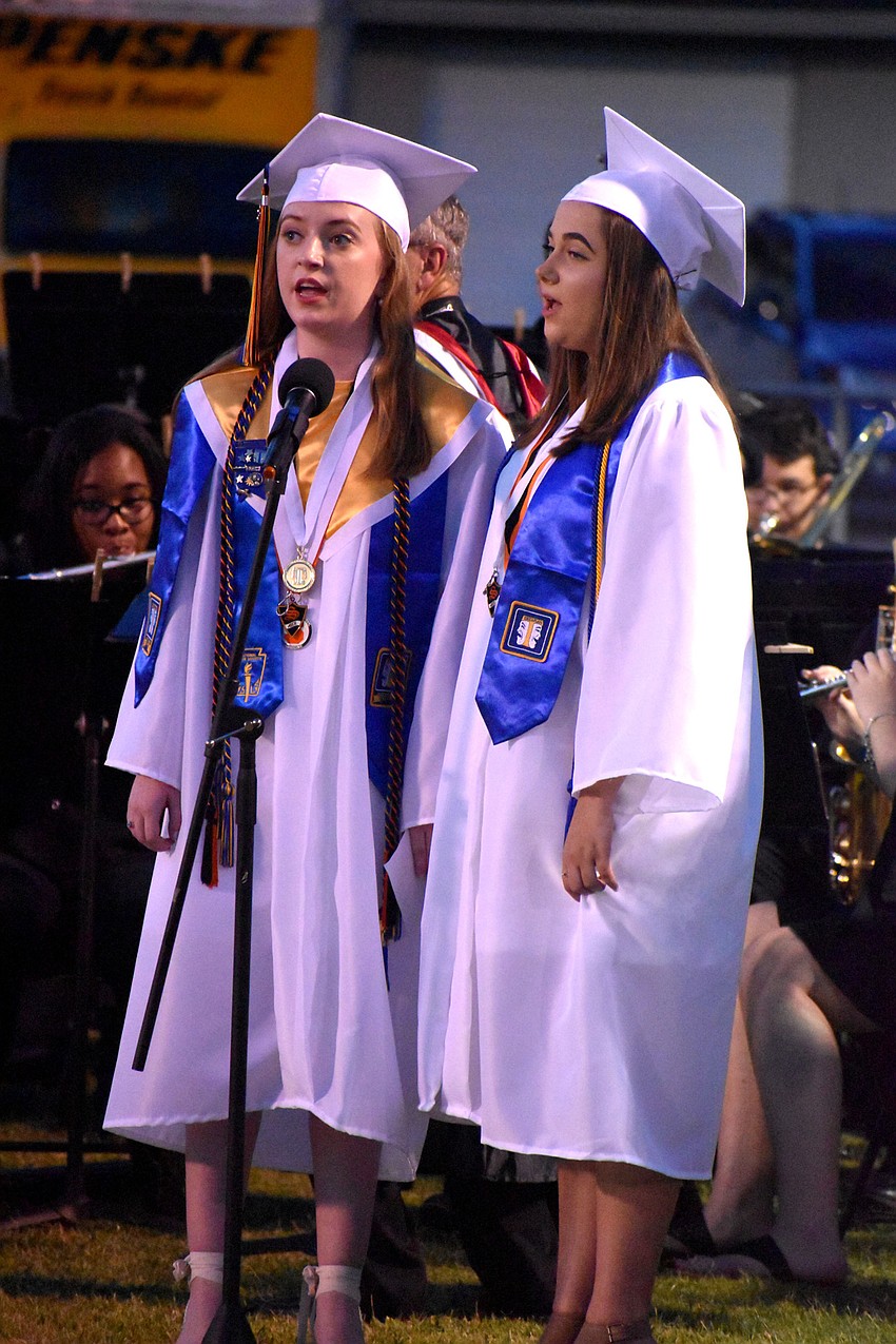 Seniors sing the alma mater to kick off the ceremony.