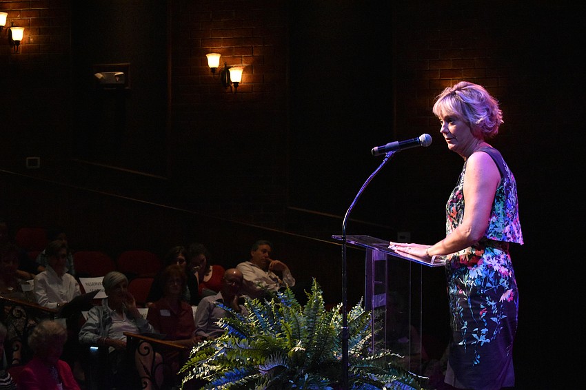 Managing Director Rebecca Hopkins welcomes the crowd.