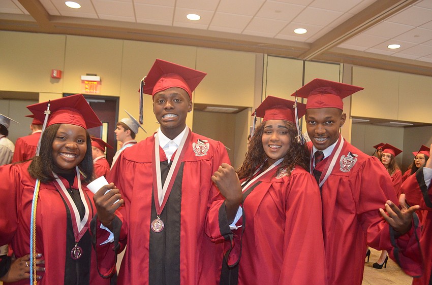 Jordae Jenkins, Raquez Jackson, Nilah Hunter and Dorien Dowling can't believe their graduation day is already here.