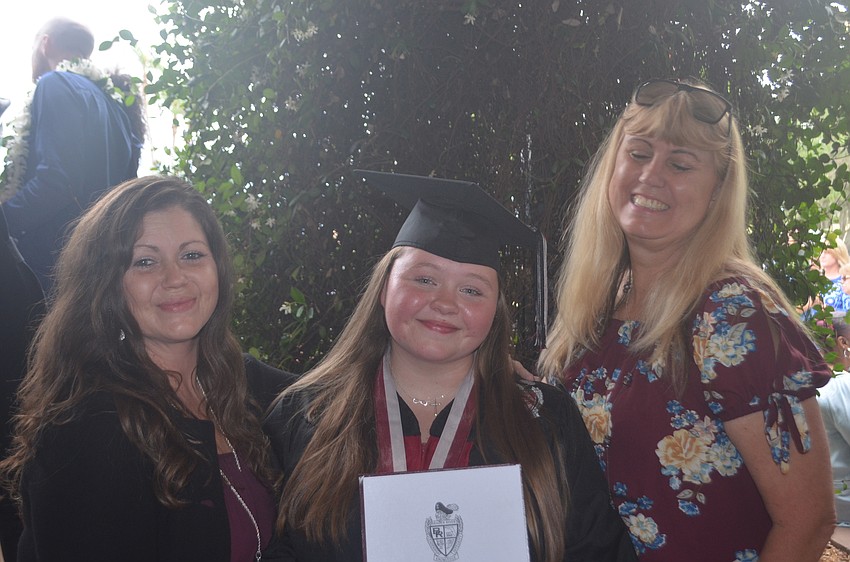 Christina Hill, Natalie Miller and Valentine Friddle are three generations of a family that is happy to see Miller being the first grandchild to graduate.