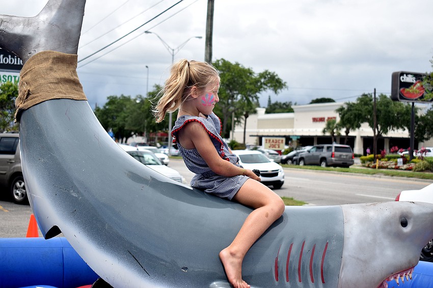 Audrey Wallin tests out the mechanical shark.