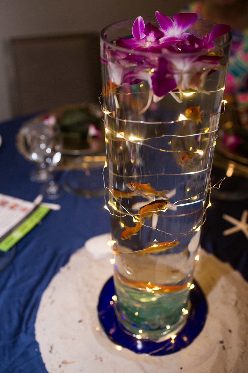 Live goldfish were the centerpieces for this table.