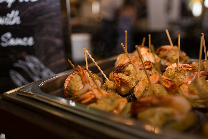 Douglas A. Chmielewicz served a surf and turf dinner.