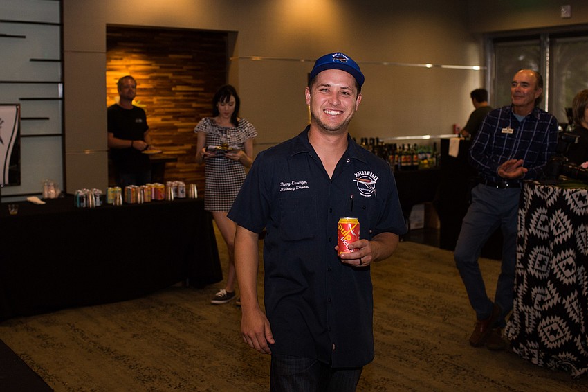 Barry Elwonger from Motorworks Brewing makes his walk to the front of the room.