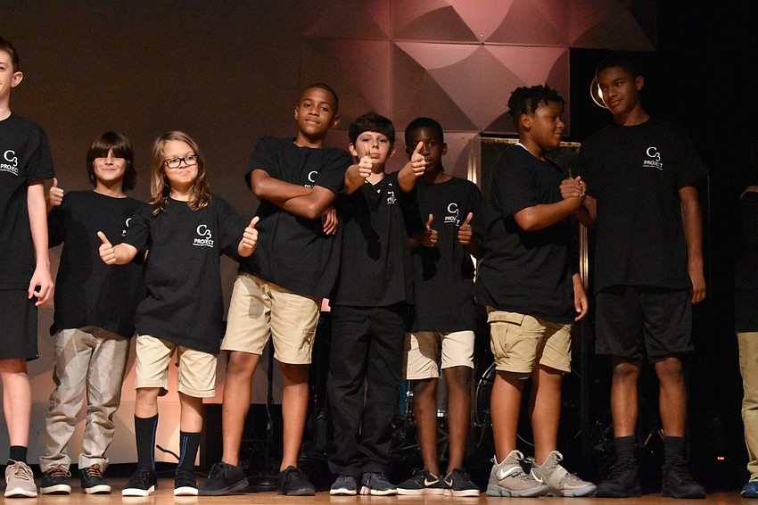 Students act out how they felt about the C3 project by the end of the 12 weeks.