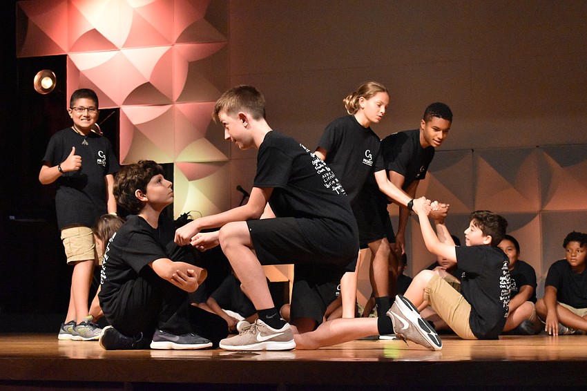 Students made several still images using their bodies to convey what