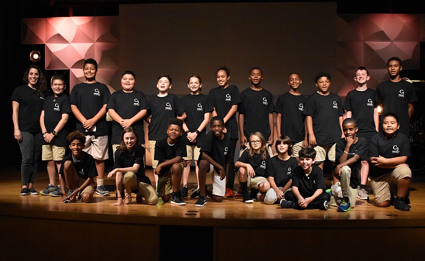 The C3 students come together at the end of the performance so parents could take a group photo.