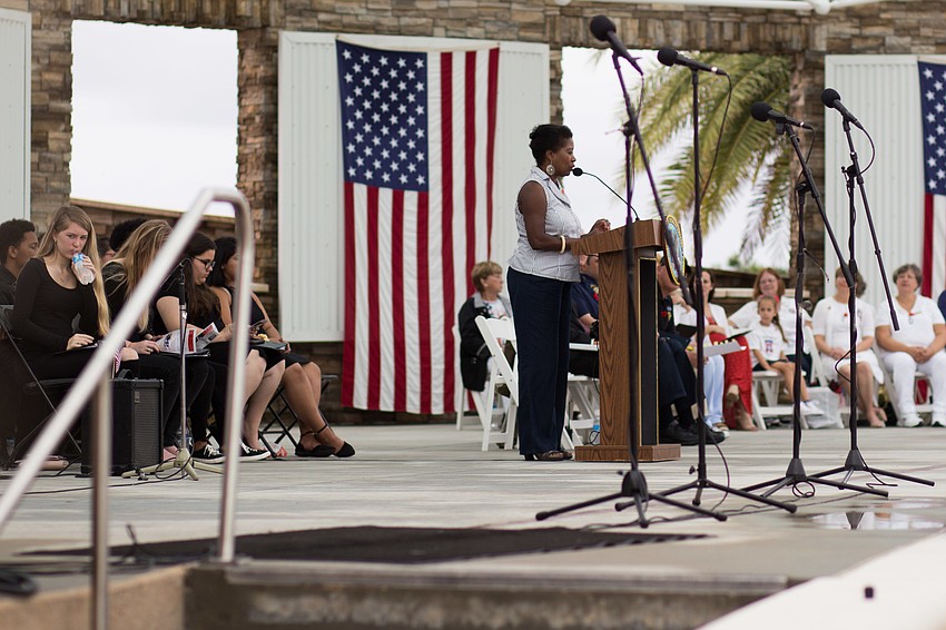 Sarasota National Cemetery Advisory Committee Chairwoman, Renee Gilmore addresses the audience.