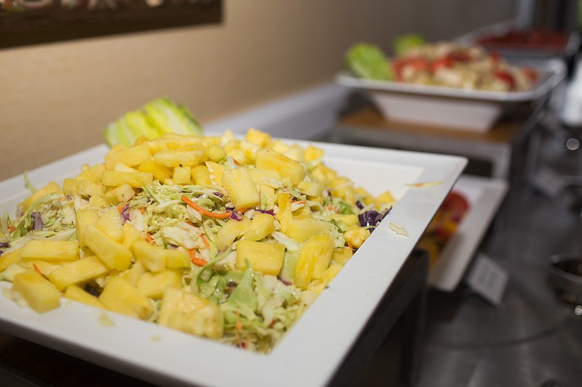 A variety of salads lined the back wall of the ballroom.
