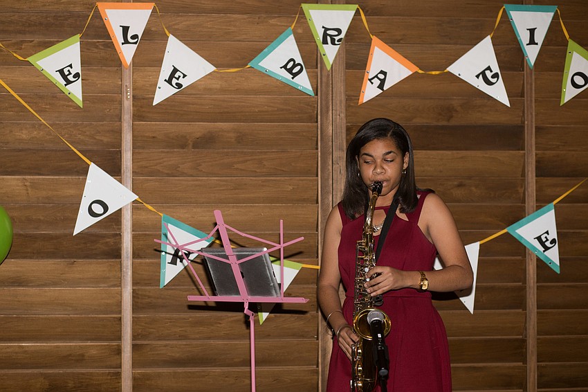 TSIC Scholar and Booker High School Sophomore Zionna Williams plays the saxophone.