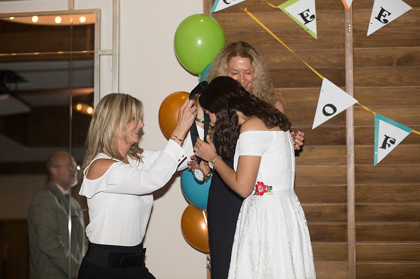 Suzanne Brown receives her medal. Brown will be attending Yale University in the fall.