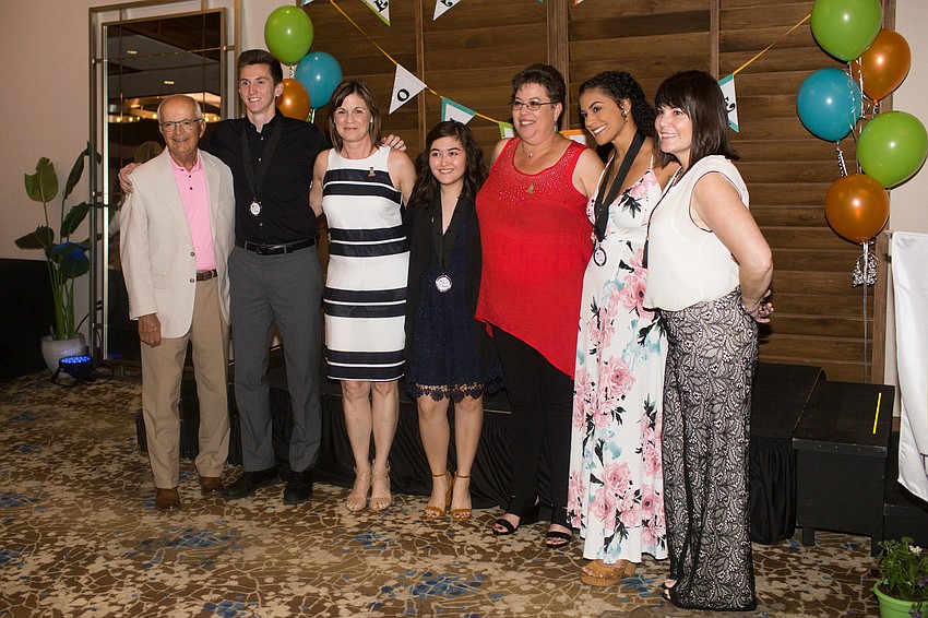 Venice High School graduates and their mentors pose for a photo.