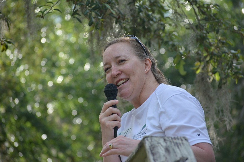 Christine Johnson of the Conservation Foundation of the Gulf Coast thanks Friends of Keep Woods for its efforts in creating a new preserve.