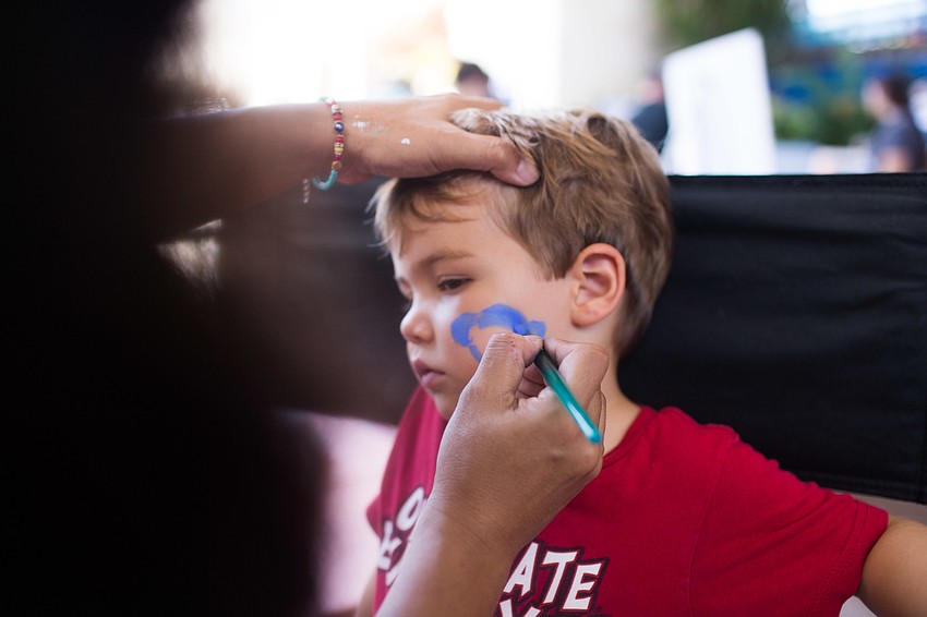 Henrik Bonasera gets his face painted.