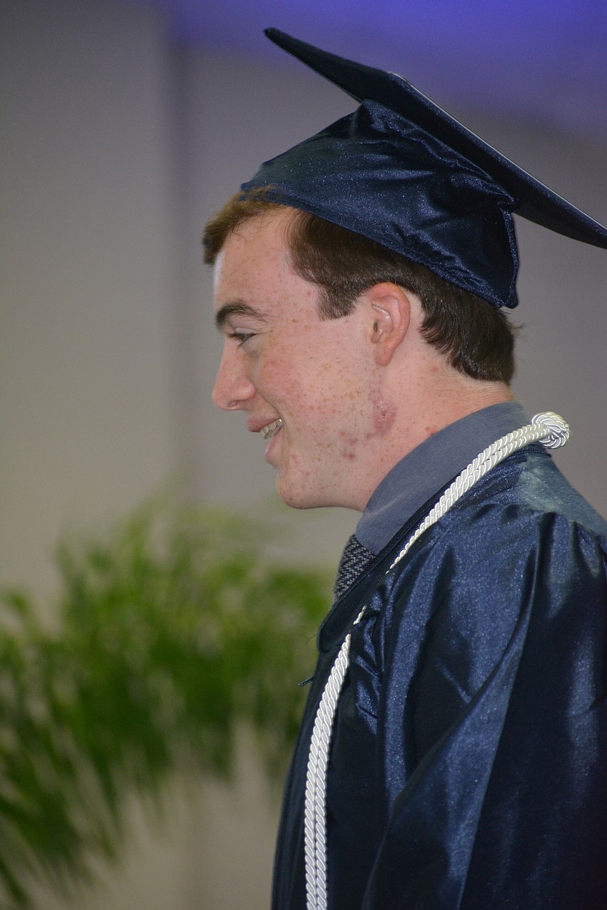 Senior speaker Matteo Romano shares comical memories of high school with his class