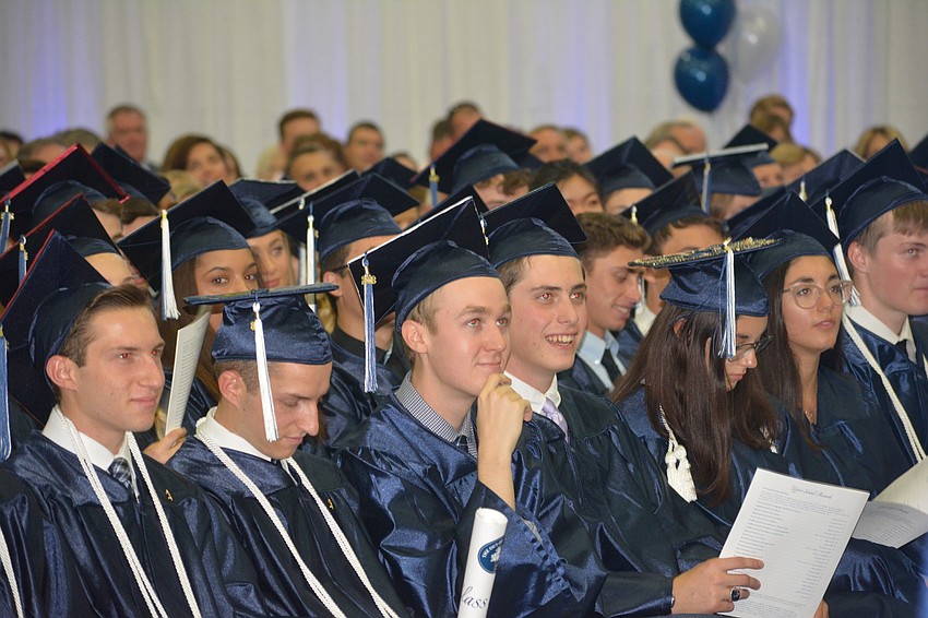 Members of the senior class enjoy the speech by senior speaker Matteo Romano.