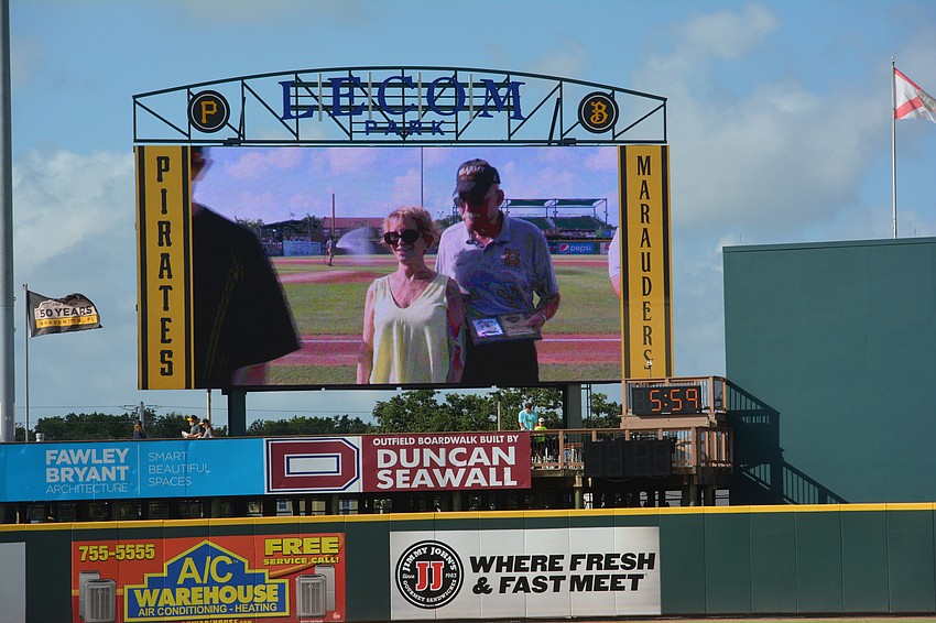 Greenfield Plantation's Gill Ruderman, a retired Army colonel, makes the big board June 2 during Military Appreciation Night at LECOM Park.