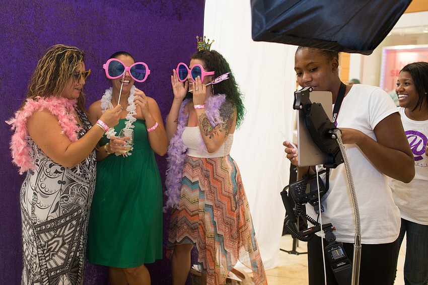 Yokie Media set up a photo booth with fun props.