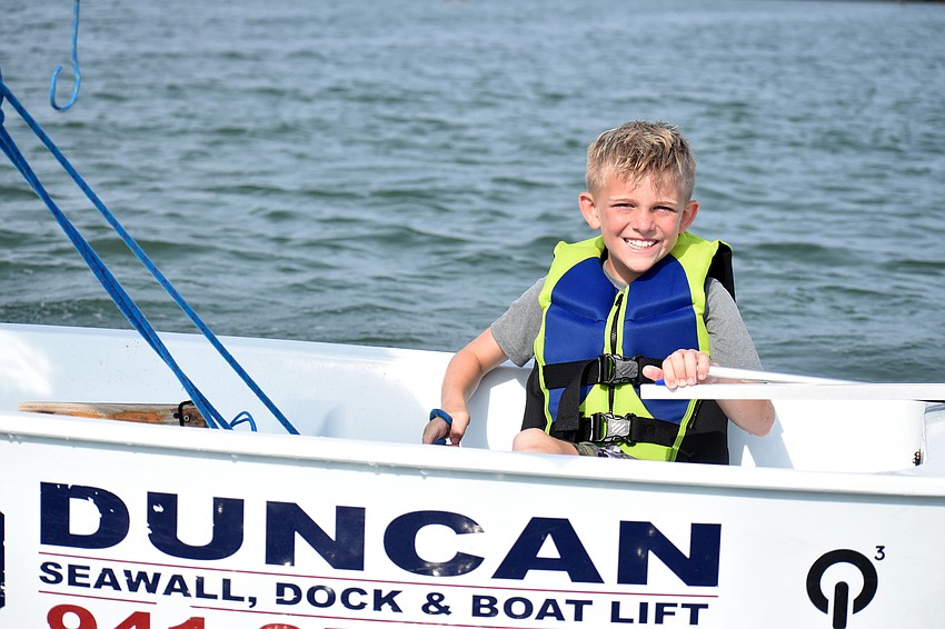 Cason Fragioni is all smiles as he sets sail on Sarasota Bay.