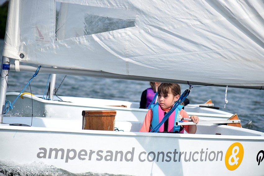 Phoebe Cobb focuses as she sails around Sarasota Bay.
