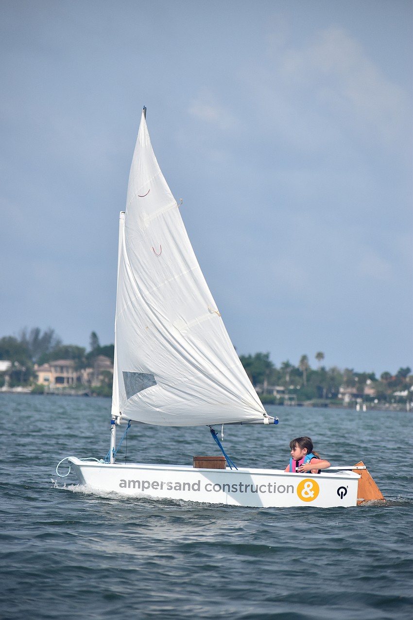 Phoebe Cobb focuses as she sails around Sarasota Bay.