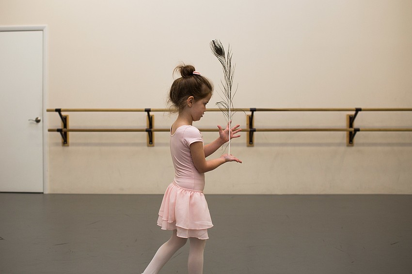 To go with the African animal theme, the students were asked to tip toe around the room while balancing a feather.