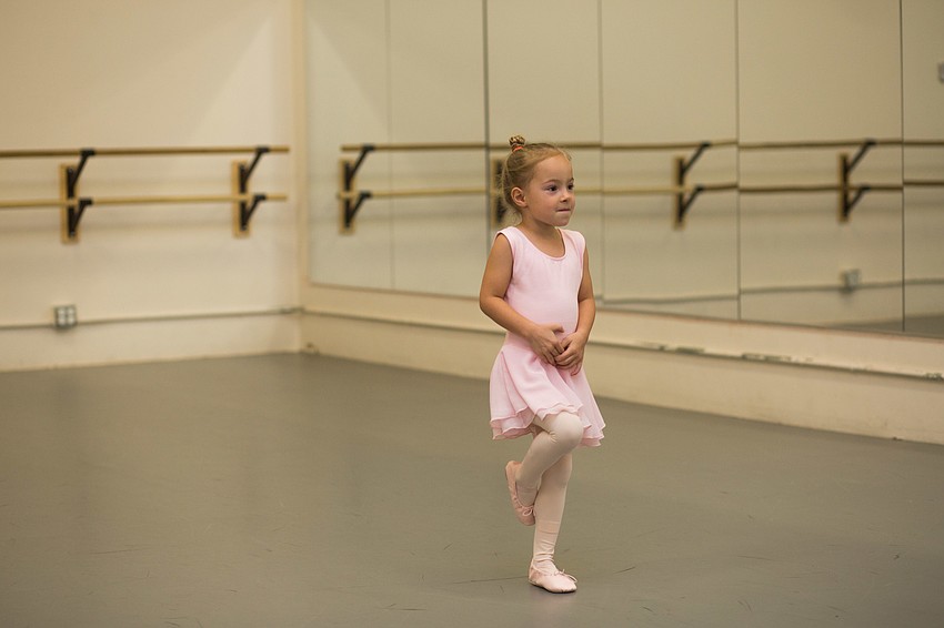 Grier Turnbull dances as a flamingo.