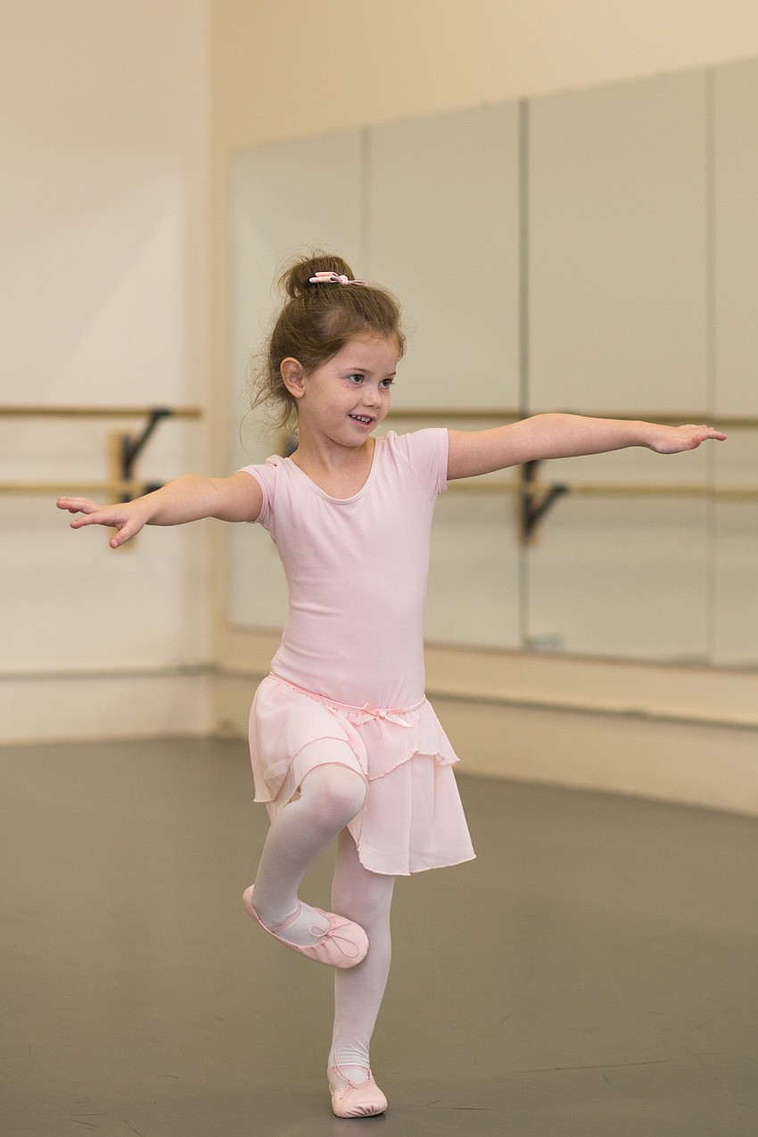 Addie Miller dances as a flamingo.