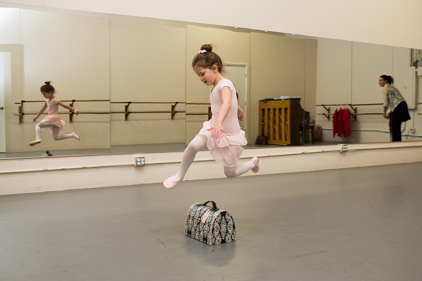 Addie Miller performs a leap.