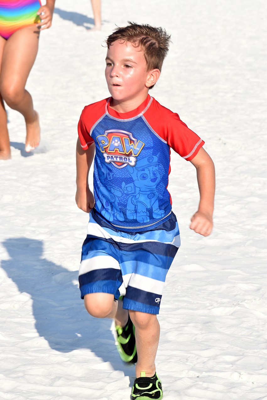 Austin Melendy races to the finish line.