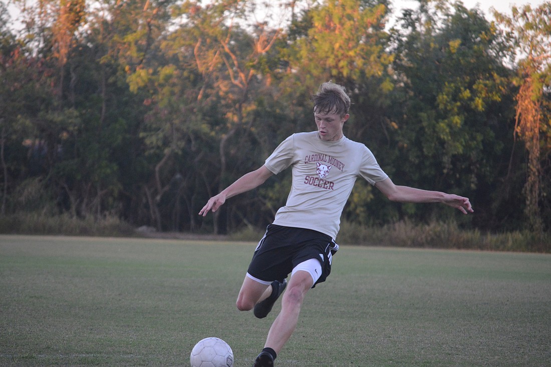 Alex Turner powers up a right-footed shot.