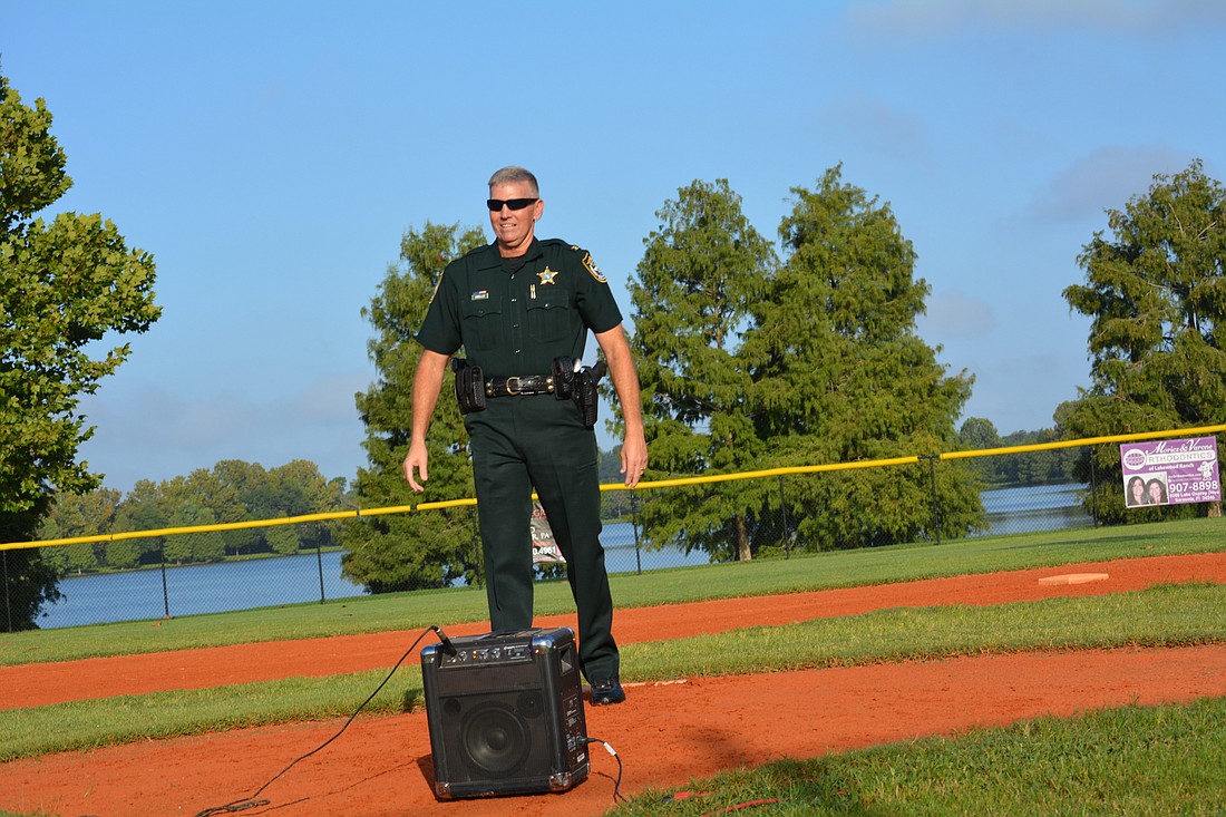 Then Manatee County Sheriff&#39;  s Office Sheriff-elect Rick Wells throws the opening pitch for the Cal Ripken baseball league&#39;  s opening day in September 2016. File photo.