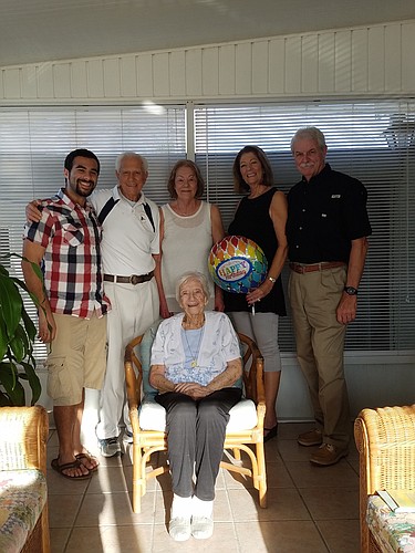 Patricia Balerna sitting, with grandson Brady on the left, husband John, daughters Patricia and Paula and son-in-law Jim.