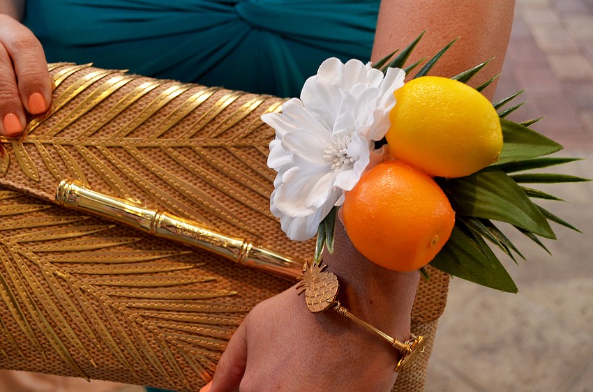 Erin Christy added some handmade tropical flair to her attire at the Asolo Rep Gala, 